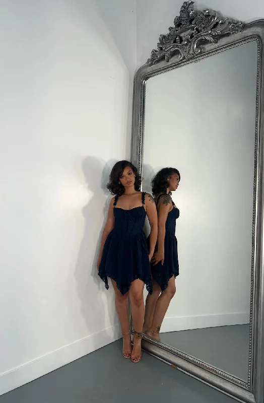 Mini dresses with asymmetric hems for a fashion - forward look Chic