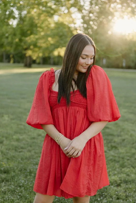 Mini dresses with pom - pom trims for a playful feel Red Puff Sleeve Smocked Mini Dress