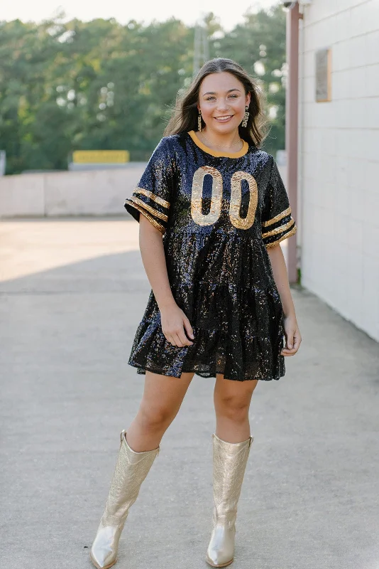Mini dresses with tassel accents for a fun touch Black & Gold Jersey Sequin Dress