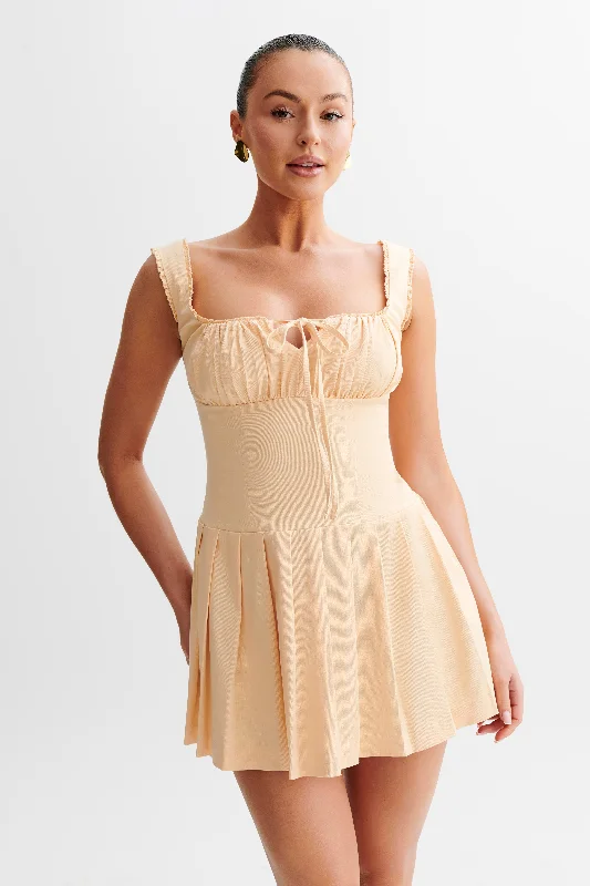 Leather mini dresses for a edgy style Donna Cotton Ruched Mini Dress - Peach