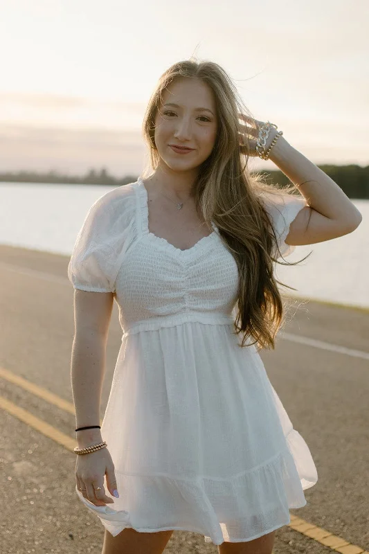 Mini dresses with spaghetti straps for a delicate look White Smock Short Sleeve Dress Mini dresses with spaghetti straps for a delicate look White Smock Short Sleeve Dress