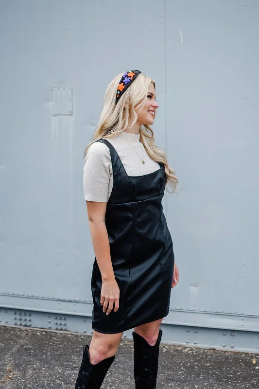 Mini dresses with pocket details for added functionality Black Vegan Leather Mini Dress Mini dresses with pocket details for added functionality Black Vegan Leather Mini Dress