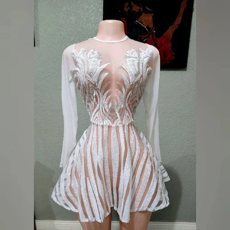 Mini dresses with mesh panels for a sexy and trendy look Sabrina long sleeve sequin skater mini dress Mini dresses with mesh panels for a sexy and trendy look Sabrina long sleeve sequin skater mini dress