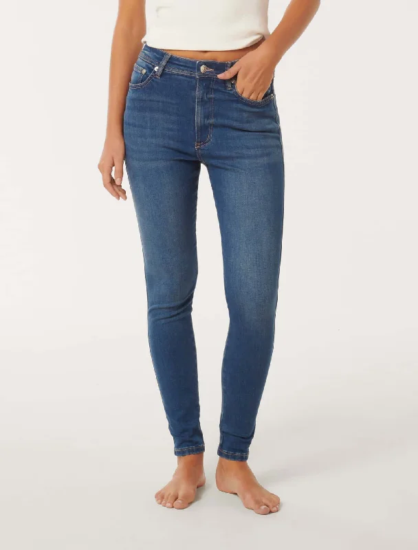 Distressed women jeans for a trendy and edgy lookAshley Mid-Rise Skinny Jeans