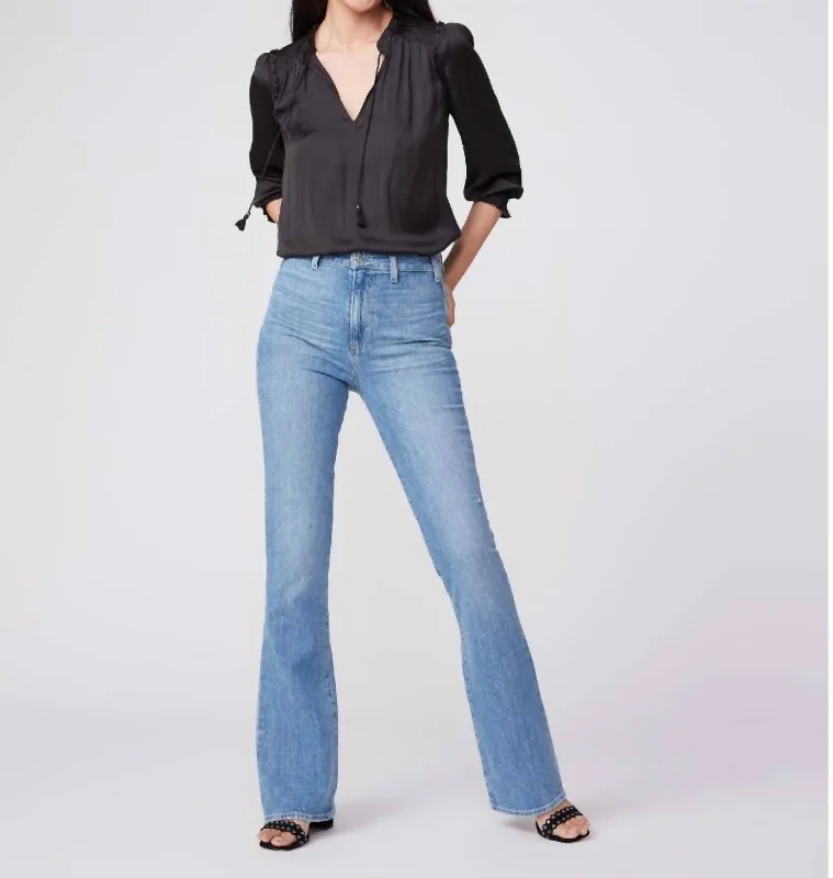 Colored women jeans in vibrant hues like red and yellowHigh Rise Laurel Canyon Jeans In Sky Distressed