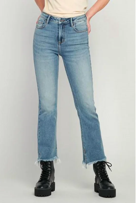 High - waisted women jeans for a flattering silhouetteMid Rise Flare Cropped Flare With Slit Jeans In Medium Wash High - waisted women jeans for a flattering silhouetteMid Rise Flare Cropped Flare With Slit Jeans In Medium Wash