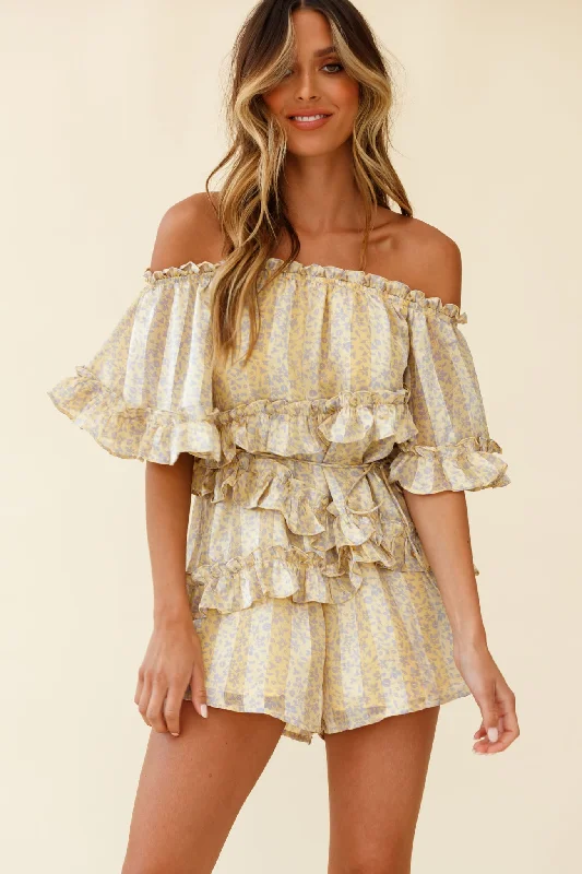Printed Abstract Women Dress for a Modern and Artistic AppealAstoria Bardot Neckline Frill Romper Floral & Stripe Print Yellow Printed Abstract Women Dress for a Modern and Artistic AppealAstoria Bardot Neckline Frill Romper Floral & Stripe Print Yellow