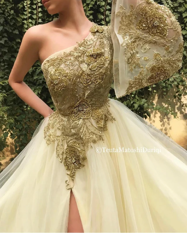 Midi dresses with pom - pom trims for a playful and festive lookEmbroidered Amour Gown Midi dresses with pom - pom trims for a playful and festive lookEmbroidered Amour Gown
