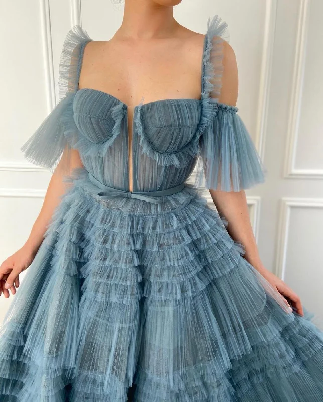Midi dresses with ruffled sleeves for a more feminine and voluminous lookEthereal Ruffled Gown