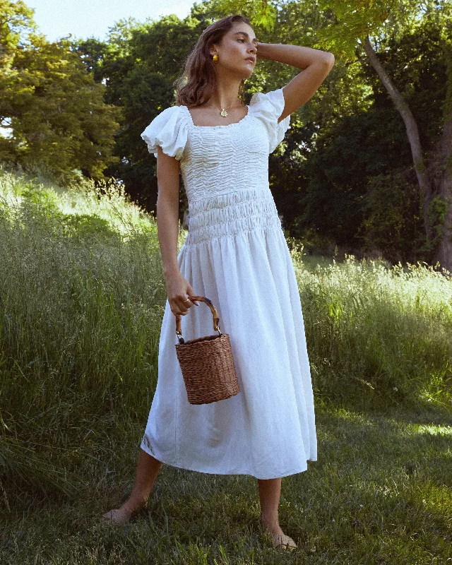 Midi dresses with ribbed textures for a unique and tactile appearanceMalta Dress