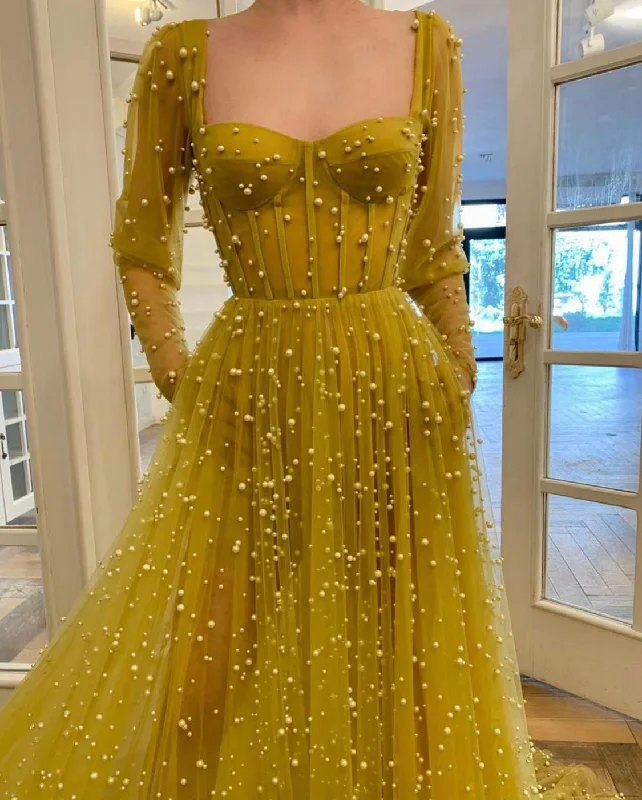 Midi dresses with polka dot prints for a playful summer outfitRosary Dream Gown