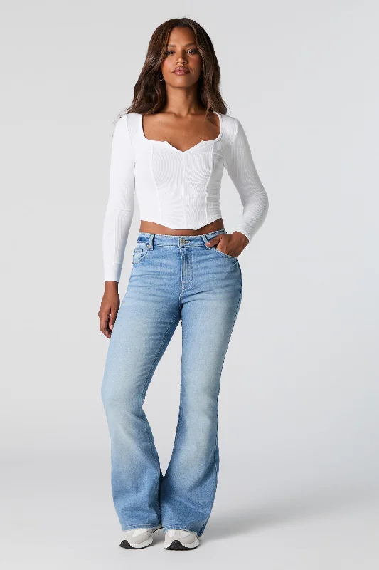 Studded Denim Top for a Glamorous and Bold StyleAustin Medium Wash High Rise Flare Jean Studded Denim Top for a Glamorous and Bold StyleAustin Medium Wash High Rise Flare Jean