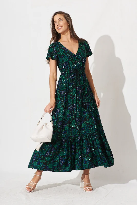 Maxi dresses with a cinched waist for a defined silhouetteIngra Maxi Dress In Emerald With Green And Blue Floral Maxi dresses with a cinched waist for a defined silhouetteIngra Maxi Dress In Emerald With Green And Blue Floral
