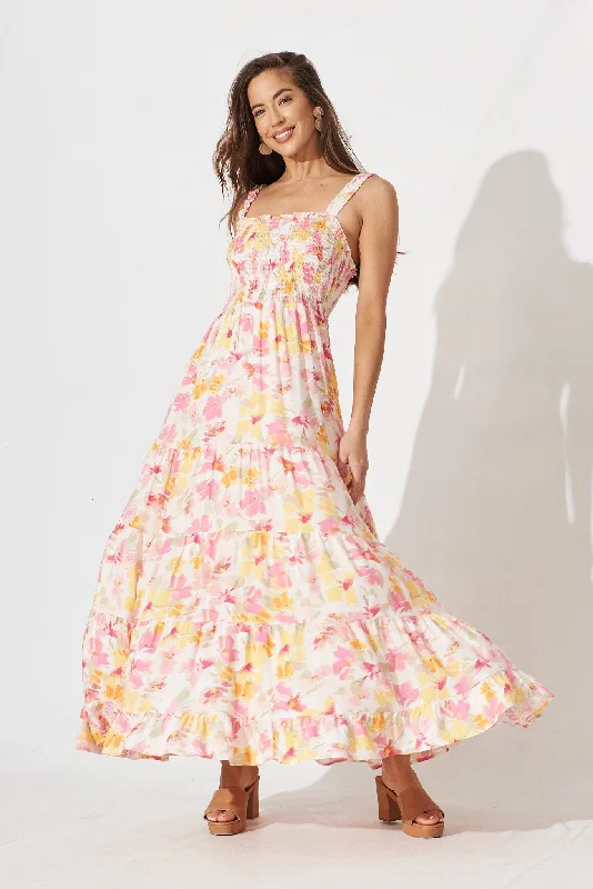 Maxi dresses with bow accents at the waist for a sweet appearanceMarano Maxi Dress In White With Yellow Floral Maxi dresses with bow accents at the waist for a sweet appearanceMarano Maxi Dress In White With Yellow Floral