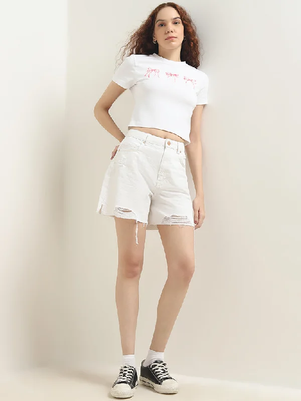 Ruffled Hem Women Shorts to Add a Feminine TouchNuon White High-Rise Ripped Denim Shorts Ruffled Hem Women Shorts to Add a Feminine TouchNuon White High-Rise Ripped Denim Shorts