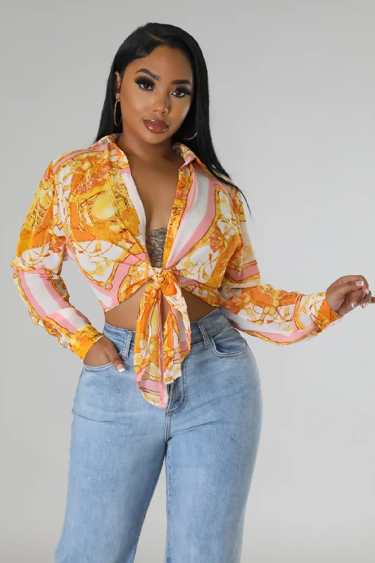 Ruffled Bodysuits with a Playful and Feminine TouchCayna Top